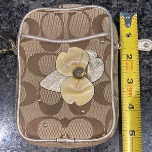 Coach signature print wristlet tan color